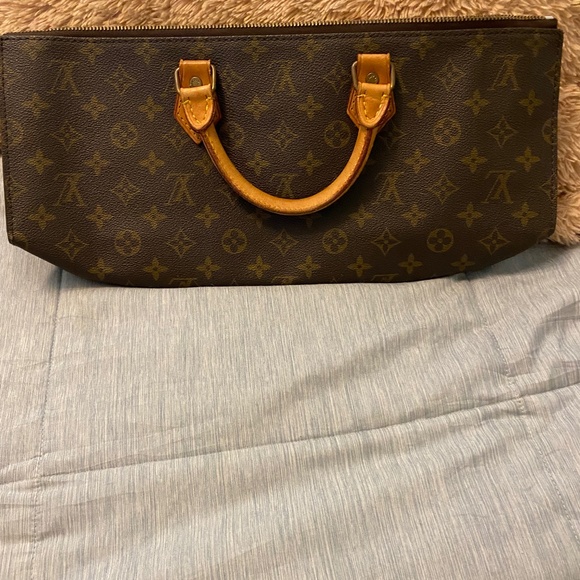 Triangle sac Louis Vuitton handbag - Picture 1 of 6